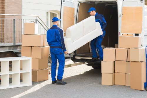 Professional movers navigating access challenges in a Camberwell property