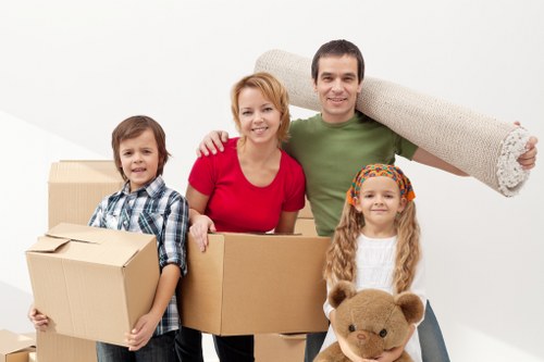 Careful wrapping of fragile items during a local packing service