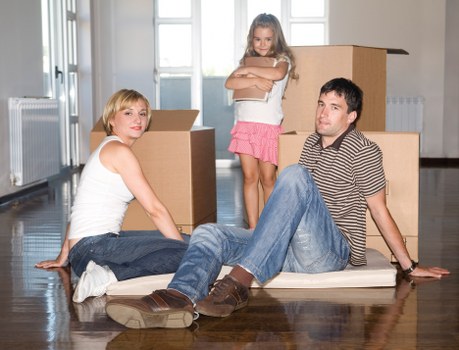 Moving boxes and furniture in a Camberwell apartment block